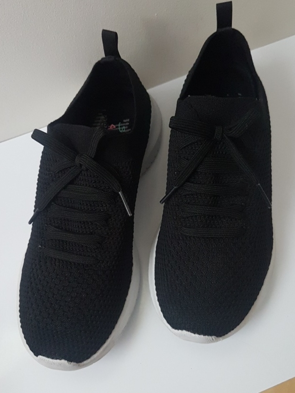 Skechers Black Knit Slip-On Sneakers with White Soles